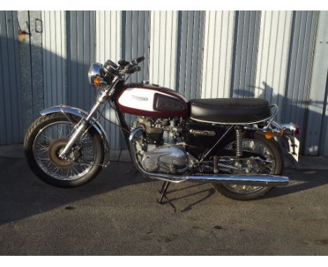 A 1975 Triumph Bonneville T140V, registration number KND 375N, frame number T140VPP71174, engine number T140V EK61544, maroon