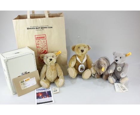 A Steiff blond mohair Daily Telegraph Millennium teddy bear with glasses and newspaper, 25cm tall, boxed, together with Marga