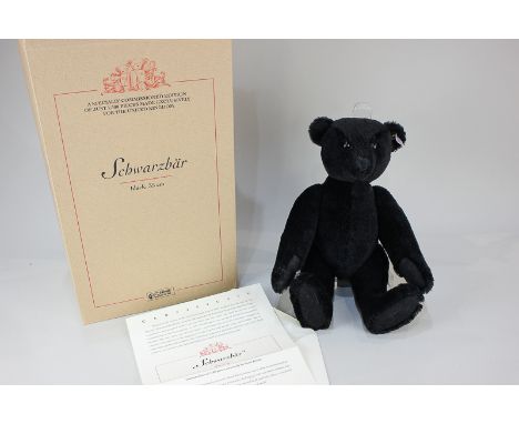 A Steiff black mohair growler Schwarzbar teddy bear, limited edition 277/1500, with original certificate and box, 35cm tall