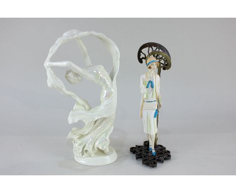 A Royal Worcester 'Spirit of the Dance' porcelain figure of an Art Deco style dancer, and another figure of a lady in 1930's 