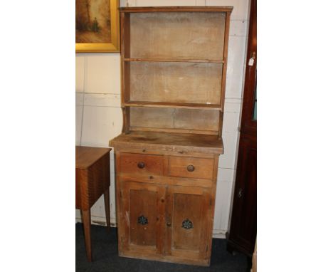 A small pine dresser with two-shelf back above two drawers and panelled cupboards, 75cm