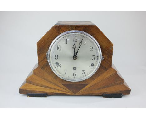 An Art Deco walnut cased chiming mantel clock with Arabic numerals, 23.5cm by 36cm