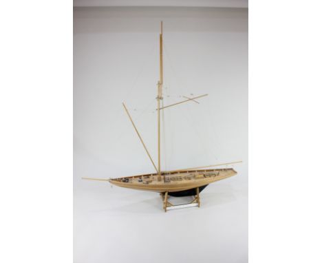 A wooden model of the Royal Yacht Britannia owned by HRH The Prince of Wales 1893 who later became Edward VII, on stand, tota
