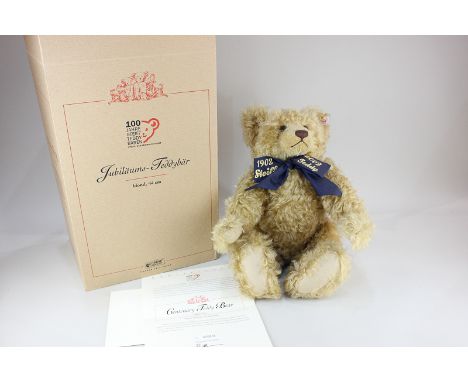 A Steiff blond mohair growler Centenary teddy bear 1902-2002, numbered 6831, with original certificate and box, 44cm tall
