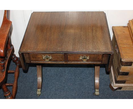 A reproduction mahogany sofa style occasional table with two drawers, on twin end supports, 59cm opening to 96cm