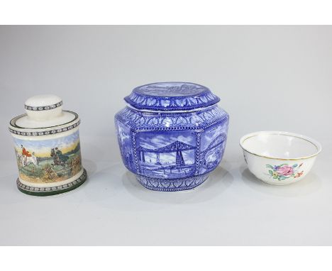 A Royal Doulton pottery jar and cover depicting fox hunting, a Maling Ware hexagonal jar and cover depicting Windsor Castle, 