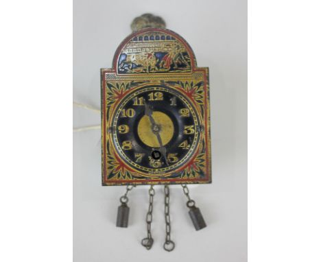 A German miniature metal wall clock, the surmount decorated with a bullfighting scene, 8cm by 5cm, (a/f)
