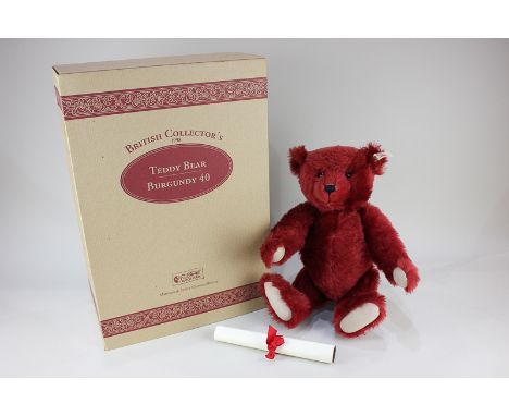 A Steiff burgundy mohair growler British Collectors 1998 teddy bear, limited edition 1006/2000, with original certificate and