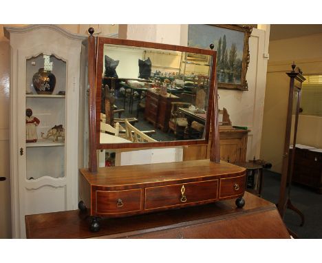 A 19th century inlaid mahogany dressing table mirror with adjustable rectangular mirror, on bow fronted box base with three d