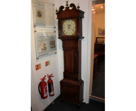 A George III long case clock with square painted dial in swan neck hood with column supports and brass finials, and case with