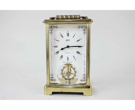 A brass cased carriage clock, the dial marked Schatz, made in West Germany, the movement stamped Aug Schatz & Sohne, 59 Germa