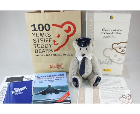 A Steiff grey mohair teddy bear, Captain Mach - The Concorde Bear, limited edition 130/1500, with original certificate and bo