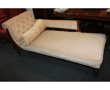 An Edwardian inlaid mahogany chaise longue with button upholstered back and side, mahogany frame inlaid with harebells, vases