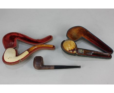 A Victorian silver mounted meerschaum pipe in case, maker HM, Birmingham 1896, together with another cased meerschaum pipe an