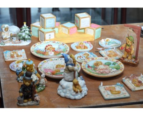 A quantity of 'Cherished Teddies' figures to include a rotating musical snowman teddy, chimney sweep teddy etc.