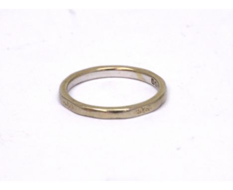 An 18ct white gold wedding band, size K 1/2, approx 2.5g.