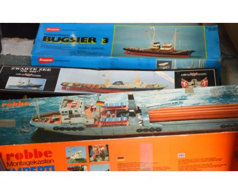 Three boat model kits; a Graupner Schnellbaukasten 'Bugsier 3' no.2147, Robbe 'Remberti Turm' radio-controlled oil rig supply