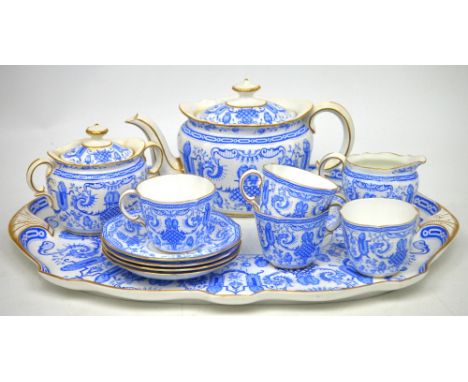 A Royal Crown Derby '4203 Pattern' tea service with blue scrolling and bird decoration, comprising tray, teapot, milk jug and