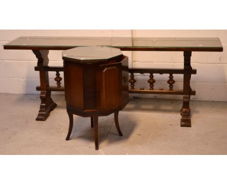 A contemporary oak long side/serving table with central carved baluster decoration to stepped bracket base, approx 180 x 40cm