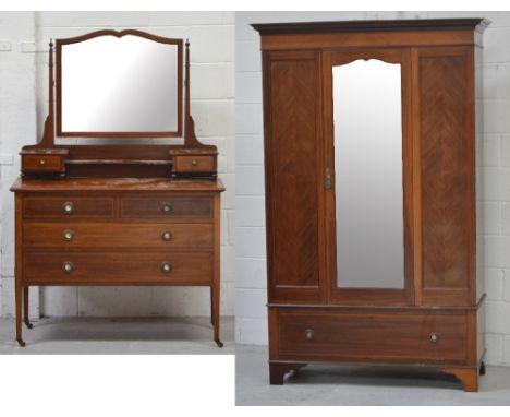 An early-to-mid 20th century inlaid mirror-door wardrobe with one large drawer to base, on bracket supports, 196 x 119cm and 