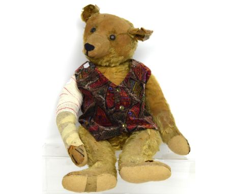 Attributed to Steiff; a c1900 large straw-filled bear, all moveable joints, felt to each paw, a long snout and dark brown eye