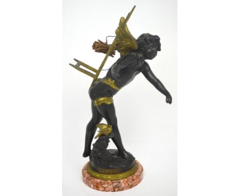 An early 20th century spelter figure of a putto on marble base with metal plaque inscribed 'Amour à La Hotte par Géo Maxim', 
