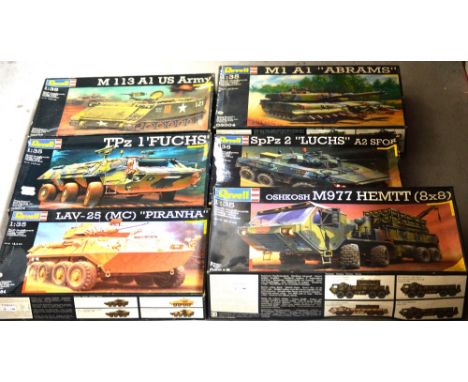 Six Revell military model kits; 'Oshkosh M977 Hemtt (8x8)' no.03012, 'LAV-25 (MC) Piranha' no.03054 (started), 'TPz1 Fuchs' n
