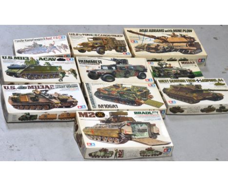 Ten Tamiya military model kits; 'M151A2' no.125, 'Hummer with M242 Bushmaster' no.143, 'USM113 ACAV Armoured Cavalry Assault 