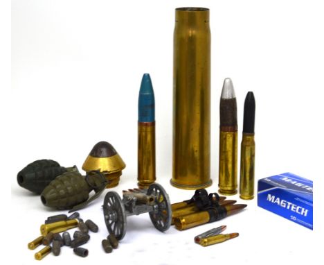 A collection of various shell cases, ammunition, detonators, two WWII hand grenades etc.
