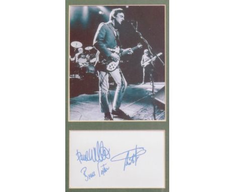 Paul Weller, Bruce Foxton &amp; Rick Butler, signatures on a card below a photographic print, the card 7.5 x 12.5cm.