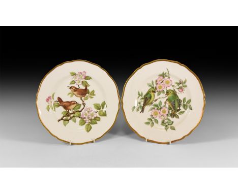 20th century AD. A pair of boxed glazed ceramic plates in the British Birds Series by Harold Holdway, comprising Wren and Gol