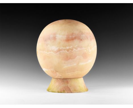 20th century AD. A large alabaster globe with hollowed out tubular section to the middle with flat base; flared separate base