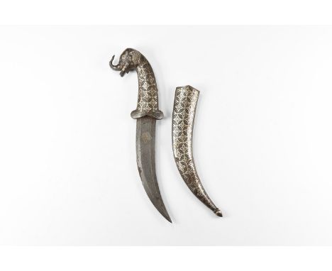 20th century AD. An iron khanjar dagger with inlay to the curved blade, hilt formed as an elephant's head, scabbard with loze