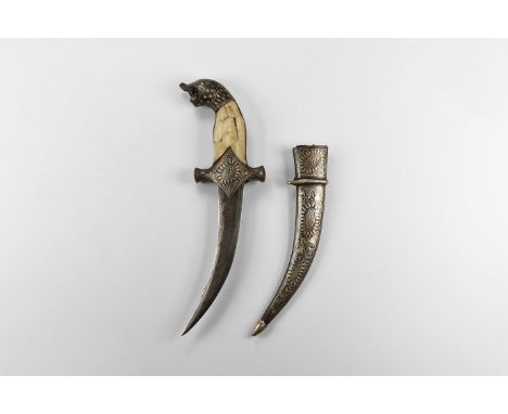 20th century AD. An iron khanjar dagger with hilt formed as a panther's head, scabbard with floral tessellation extending to 