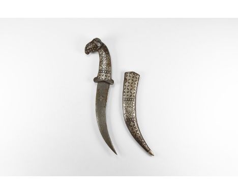 20th century AD. An iron khanjar dagger with inlay to the curved blade, hilt formed as a gazelle's head, scabbard with lozeng