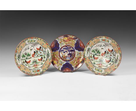 20th century AD. A mixed group of glazed ceramic plates comprising: two with geometric border and central scene with birds; o