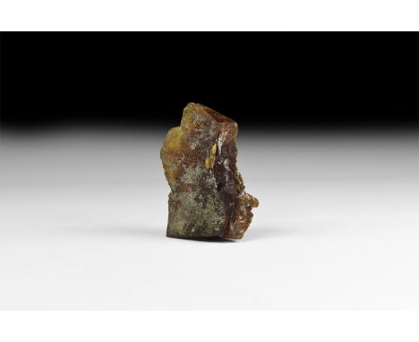 Lower Oligocene Period, Oligocene Period, 45 million years BP. An sawn but unworked irregular block of amber, roughly trapezo