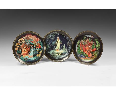 20th century AD. A mixed group of glazed ceramic plates each with a scene from Russian folklore including the 'Snow Queen' an