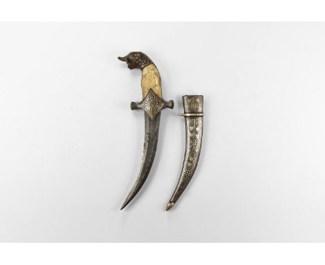 20th century AD. An iron khanjar dagger with hilt formed as a panther's head, scabbard with floral tendril tessellation exten