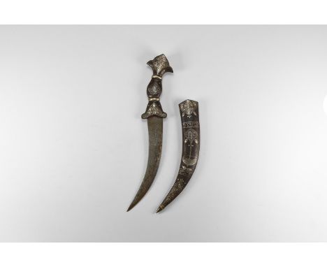 20th century AD. A khanjar dagger with curved blade, grip with inlaid silver floral motifs and transverse rings, iron scabbar