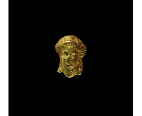 An undated archaistic bronze female bust in the style of 2nd-3rd century AD, modelled in the half-round.  43 grams, 46mm (1 3