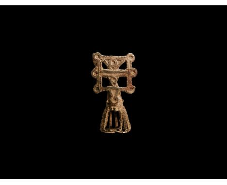 11th-12th century AD. A silver finial comprising a conical cage with granules to the stems, openwork square plaque with granu