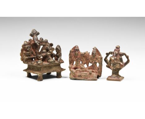 20th century AD. A mixed group of copper-alloy statuettes comprising of: a seated god Ganesha with elongated trunk; a seated 