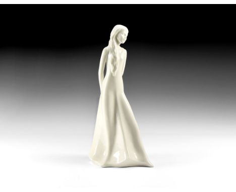 20th century AD. A hollow-formed white-glazed ceramic figurine of a youthful female with pensive expression; marked to the un