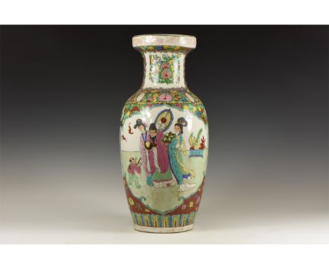 20th century AD. A glazed ceramic vase with waisted neck, polychrome floral ornament framing two scenes: one depicting figure