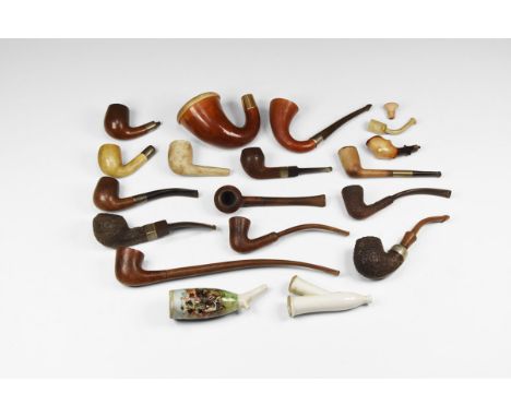 Mainly 20th century AD. A mixed group of nineteen tobacco pipes and parts including plain clay, glazed ceramic, briar and oth