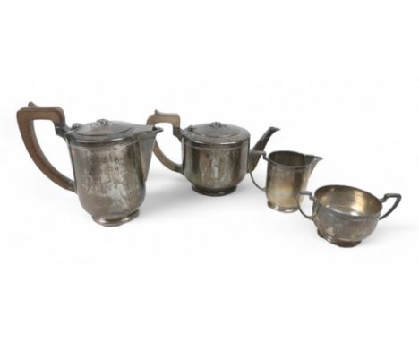 A silver four piece tea service, Harrods London 1938/39 1939/40, total weight 1876.5g/60.3 toz. (4)