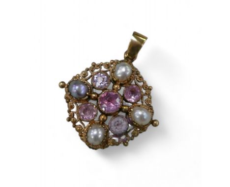 A pink stone and half pearl gold pendant, with cannetille work design, 2.2 by 2.7cm overall, 3.5g.