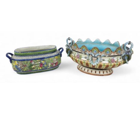 An Austrian maiolica "Venezia" centre piece and a larger majolica centre piece, largest 45 by 25 by 23cm high. (2)