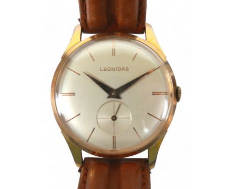 A Leonidas gents manual wind gents wrist watch, on leather strap, 33mm case with secondary dial.
